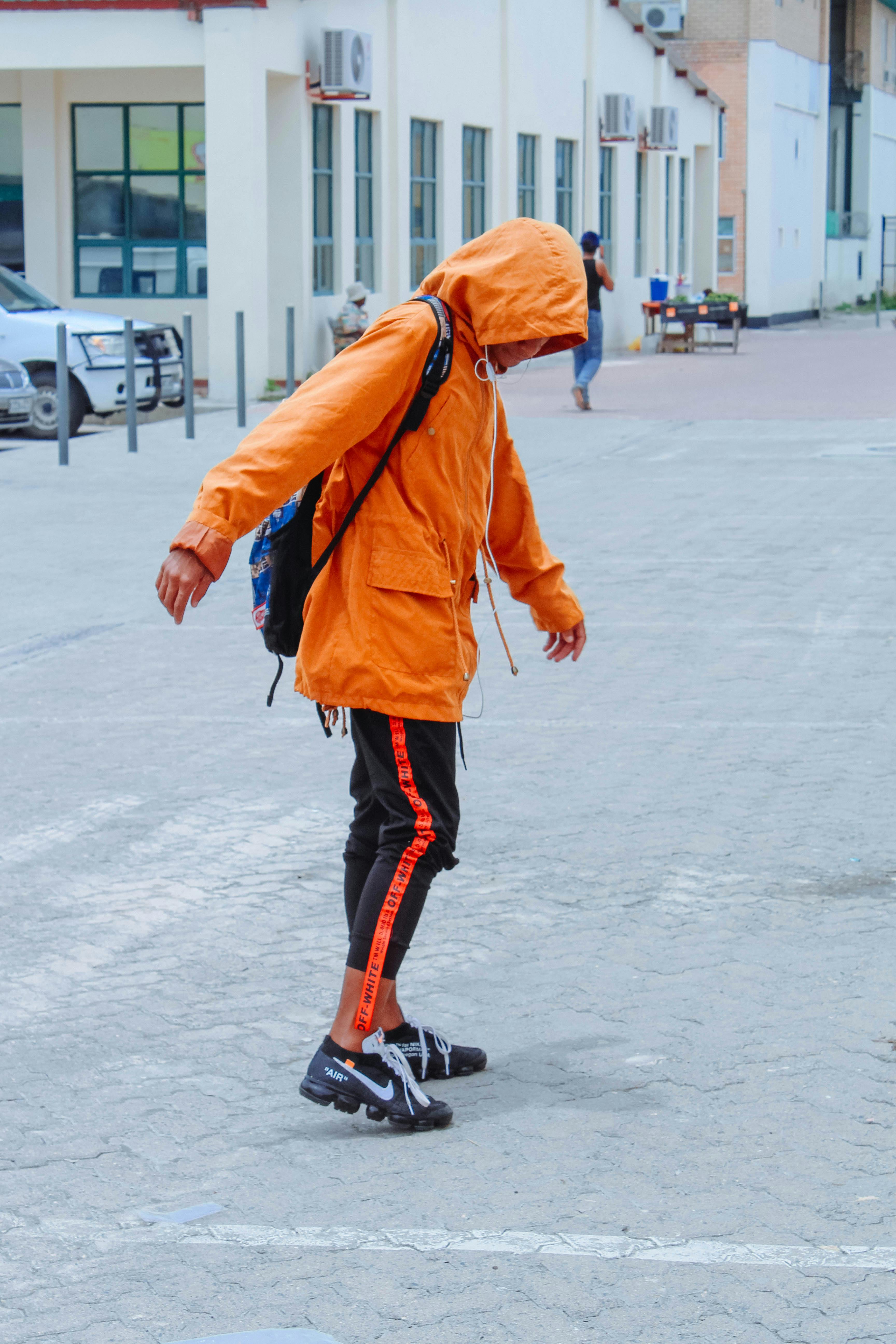 Free stock photo of Man wearing orange jacket