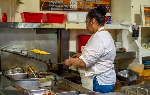 Woman Working in Kitchen