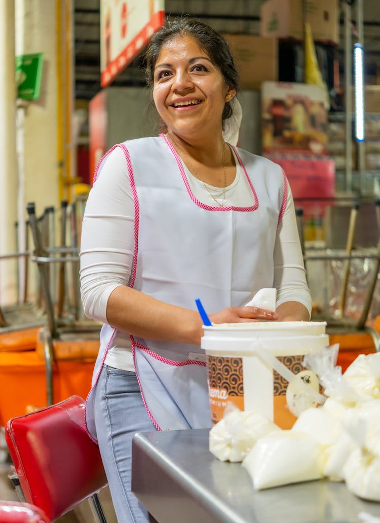 Smiling Woman In Kitchen