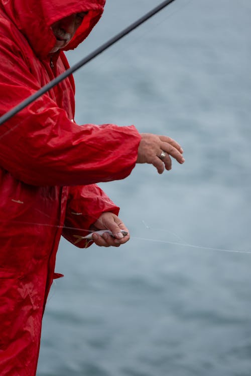 Close up of Fisherman in Raincoat · Free Stock Photo