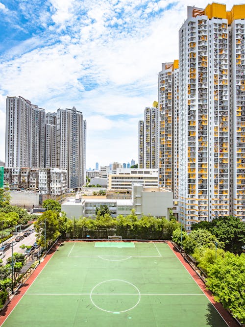 Residential Skyscrapers around Soccer Pitch