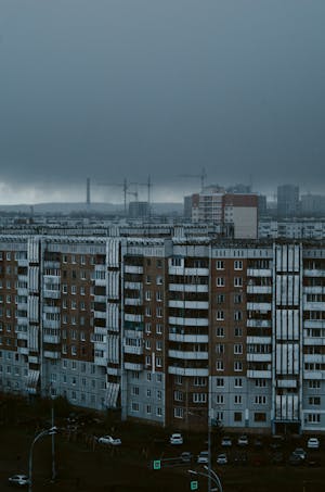 Residential Buildings Under Cloudy Sky · Free Stock Photo