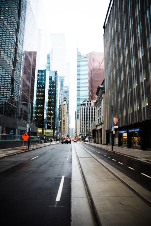 Free Vibrant street scene in downtown Toronto, showcasing skyscrapers and urban architecture. Stock Photo