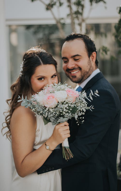 Smiling Newlyweds Embracing