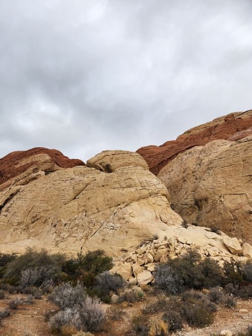 Free Captivating rocky landscape of Red Rock Canyon under cloudy skies. Stock Photo