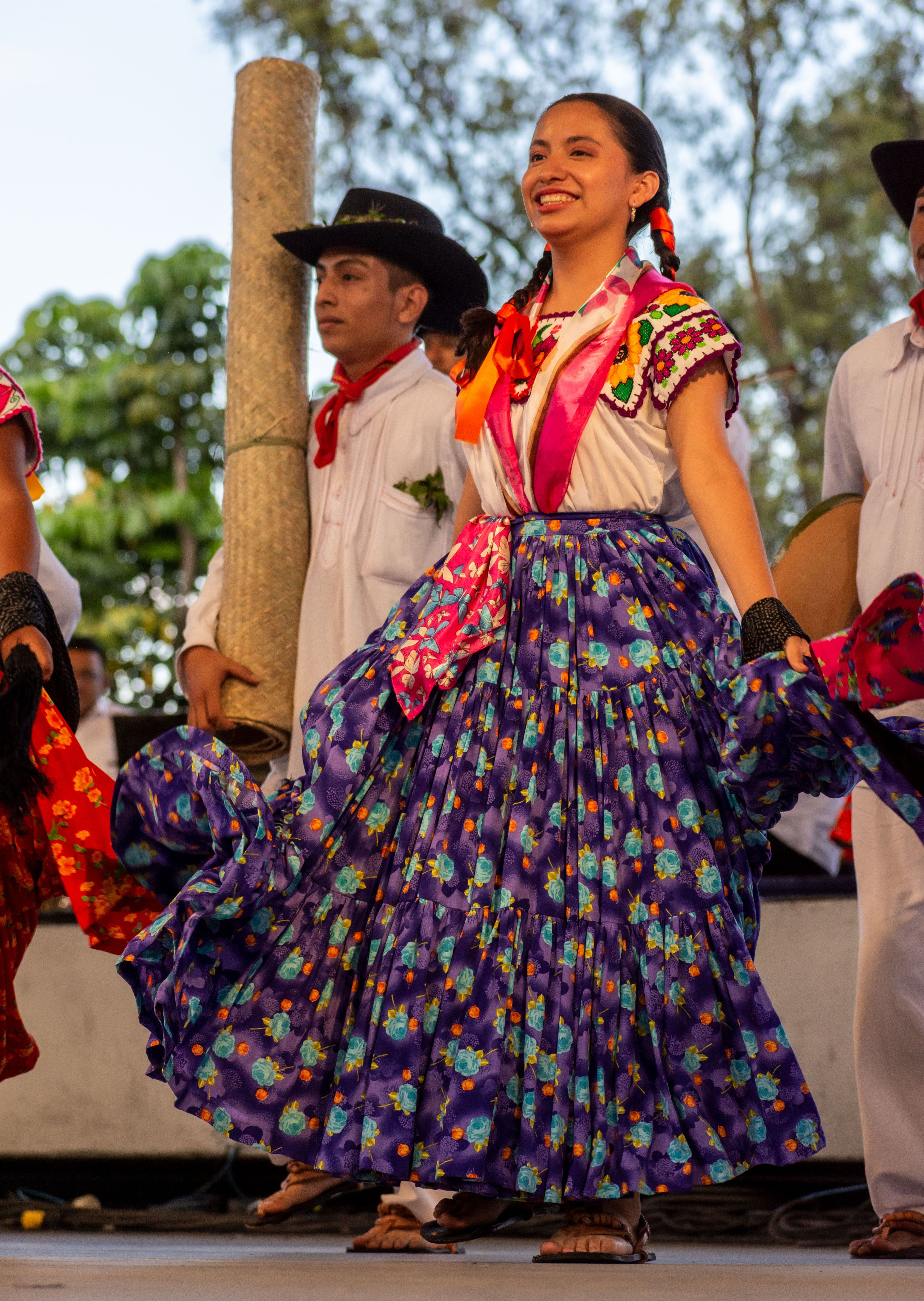 Smiling Dancer in Traditional Clothing · Free Stock Photo