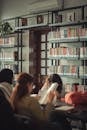 Women Sitting at Library