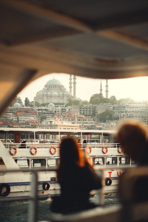 Free Explore Istanbul's iconic Suleymaniye Mosque as seen from the Bosphorus, capturing urban and maritime charm. Stock Photo