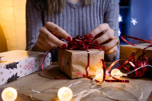 Free Woman Doing Gift Wrapping Stock Photo
