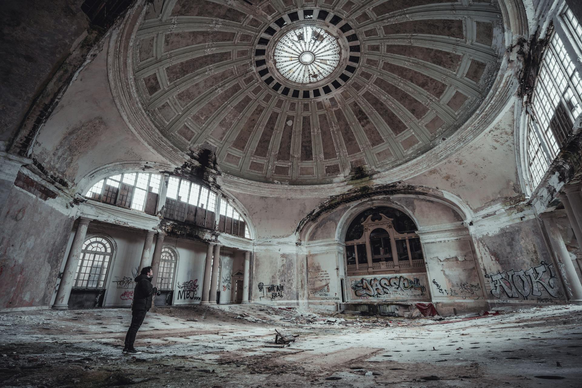 Person Standing Inside Of Abandoned Building