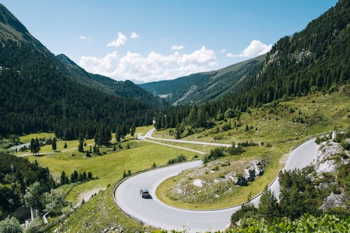 Gray Road and Green Mountains