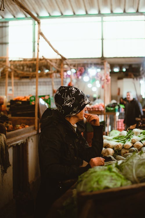 Woman in Hat at Bazaar