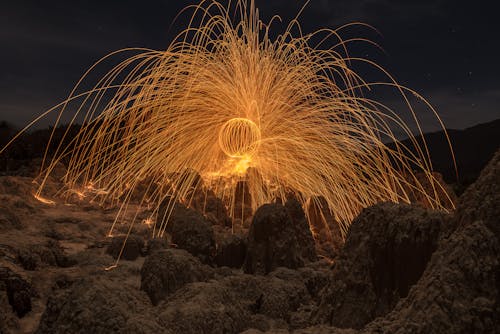 Steel Wool Photography of Brown Rock Formations
