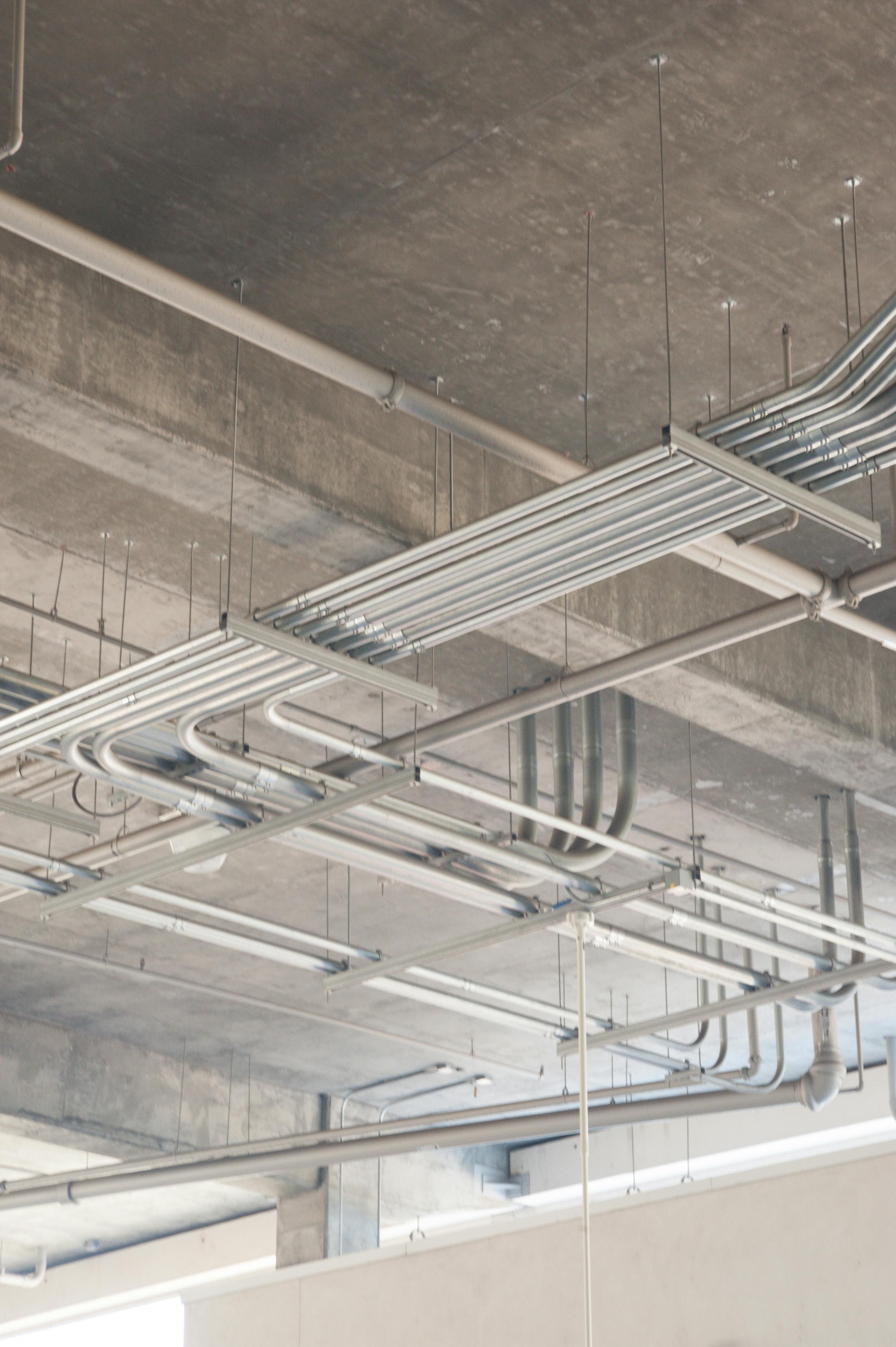 metal pipes hanging under ceiling