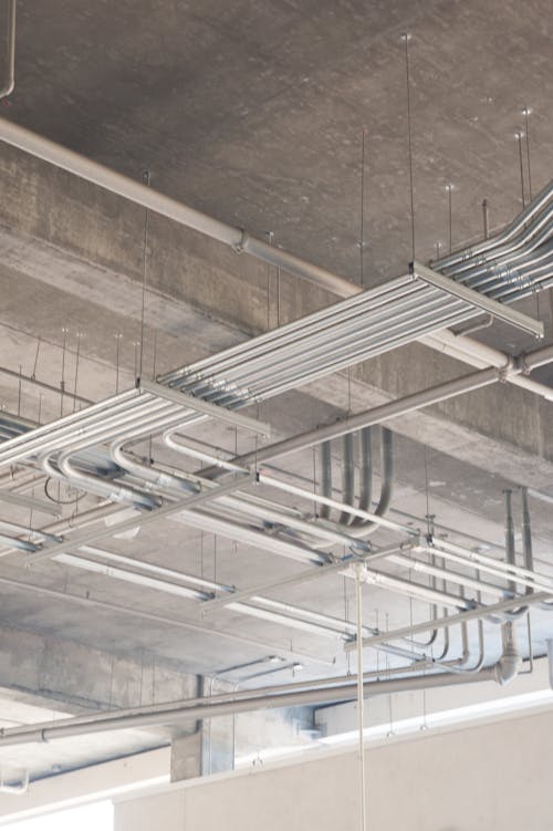Metal Pipes Hanging under Ceiling