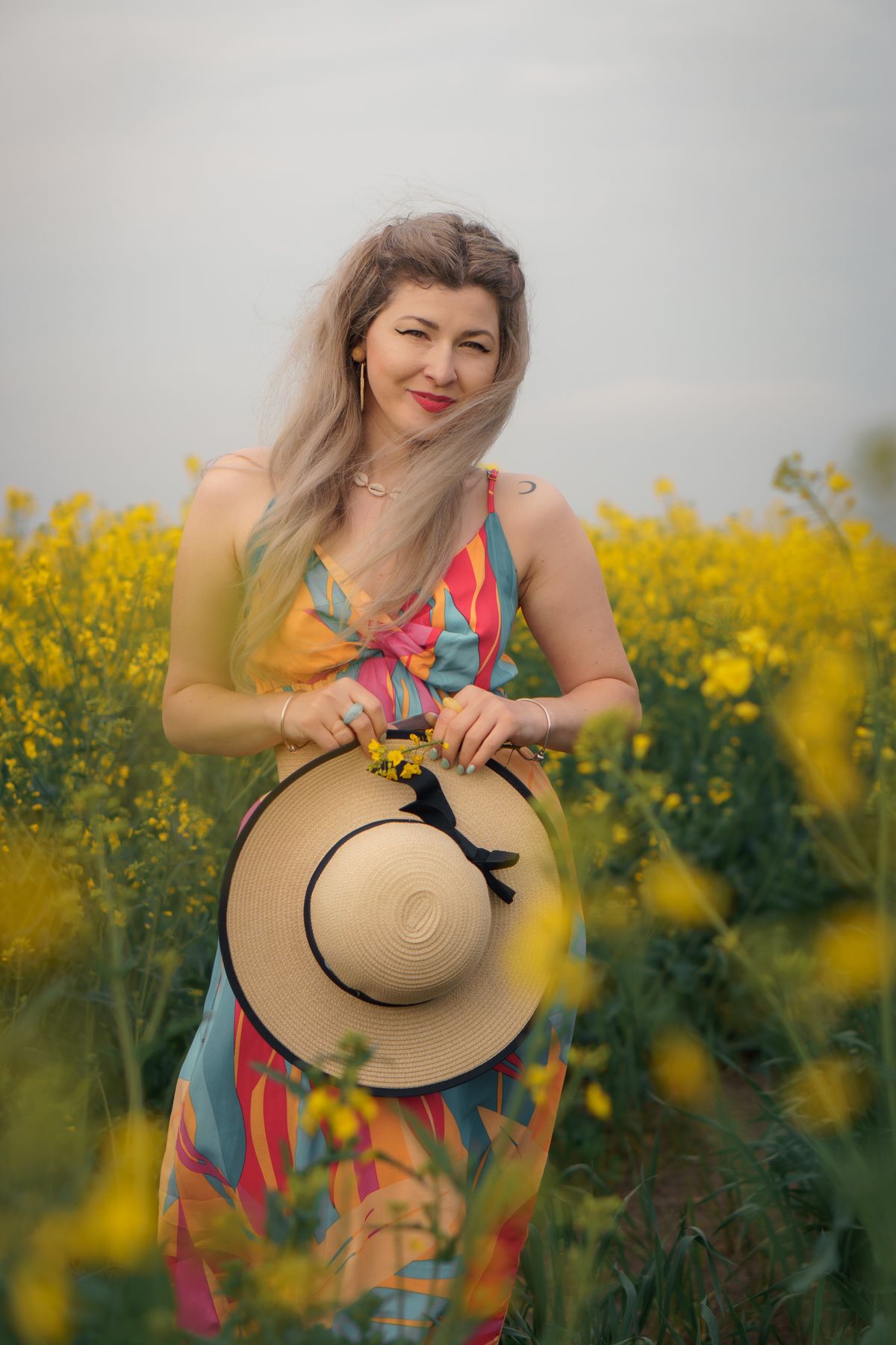 A Woman in Yellow Dress Standing in the Middle of Yellow Flower Field ...