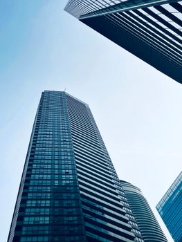 A view of towering skyscrapers in Toronto's financial district during the day.