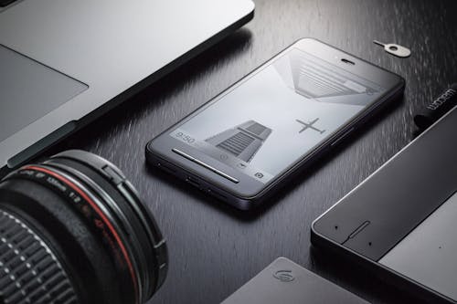 Gratuit Smartphone Android Noir Sur Surface Noire Photos