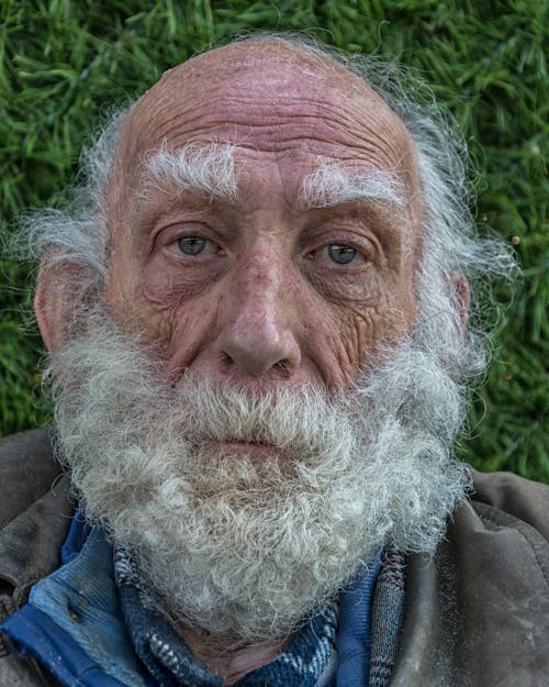 Close-Up Portrait of an Elderly Man with Big Gray Beard