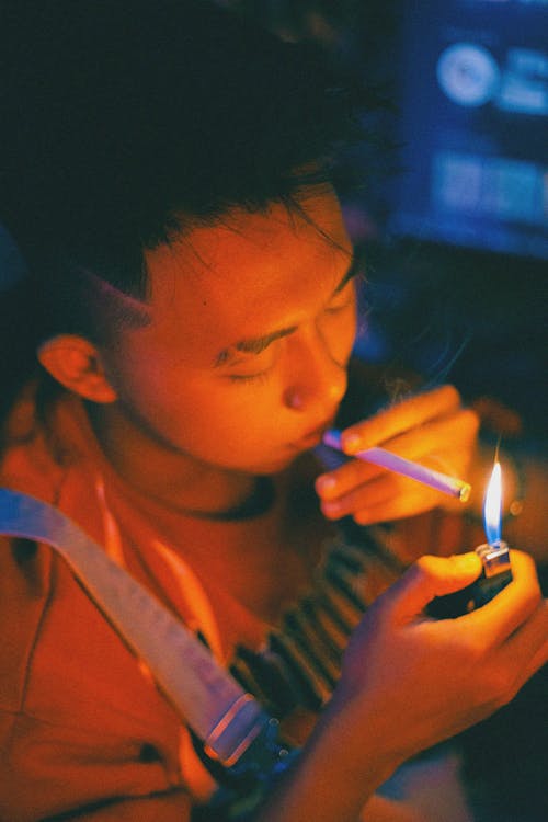 Man Burning Cigarette 