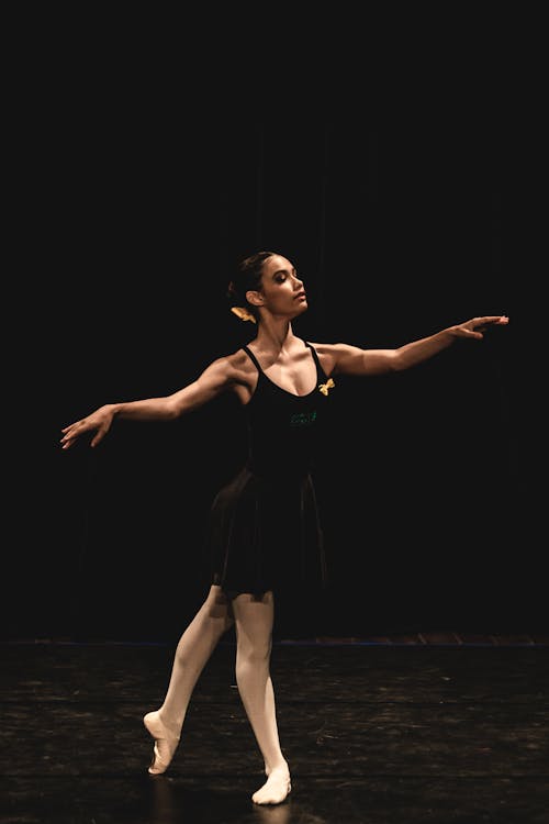 Ballerina Dancing on Stage