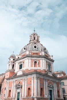 A magnificent Renaissance church with a striking dome in Rome, Italy, showcasing classic architecture.