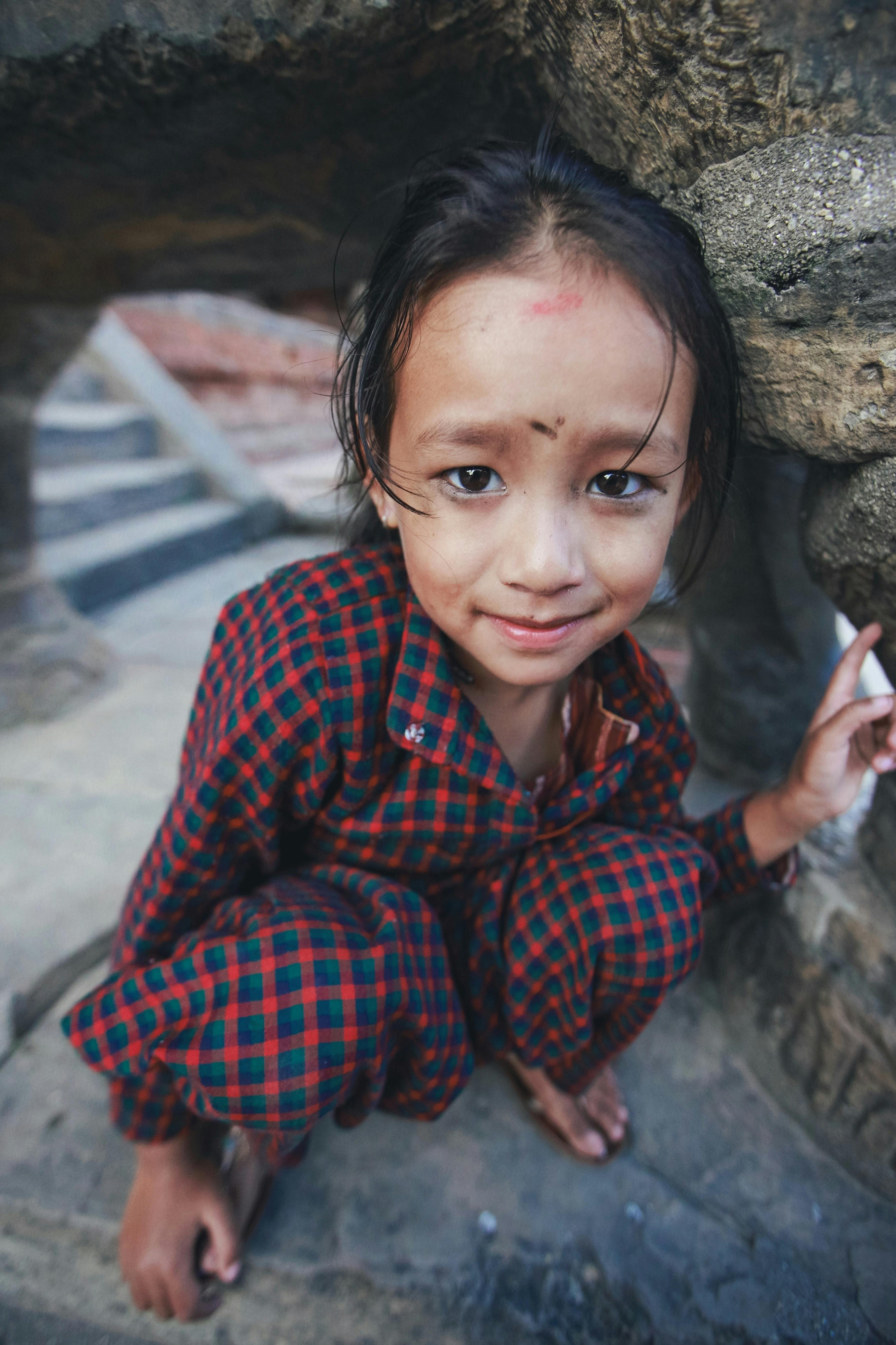girl-crouching-in-pajamas-free-stock-photo