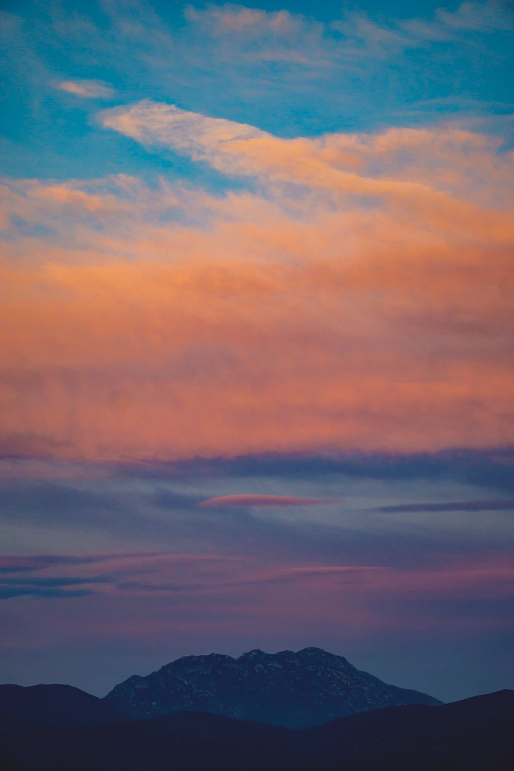 Dramatic Sunset Sky over the Hills · Free Stock Photo