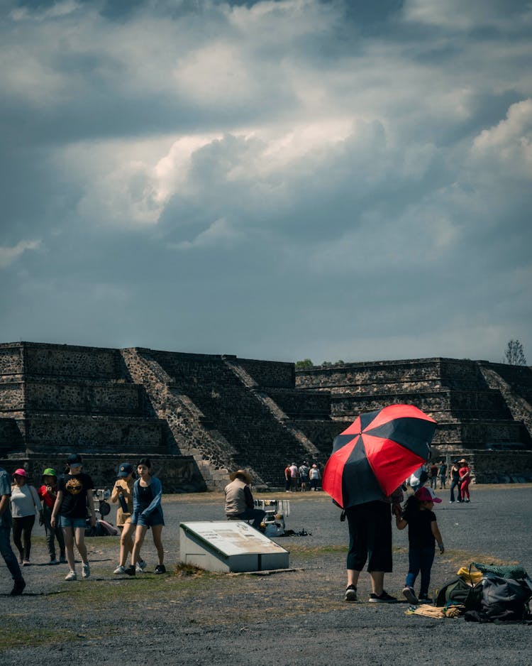 Tourists On The Avenue Of The Dead In The Mesoamerican City Of Teotihuacan