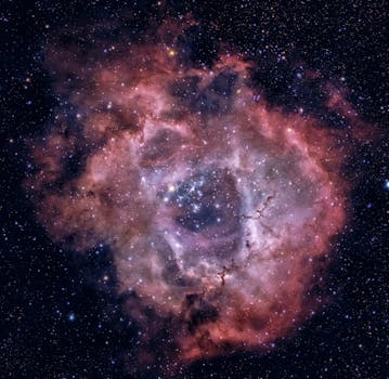 Stunning image of the Rosette Nebula showcasing vibrant colors and cosmic details.