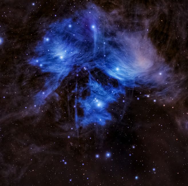 Captivating image of the Pleiades star cluster. Explore the cosmos with this beautiful celestial display.