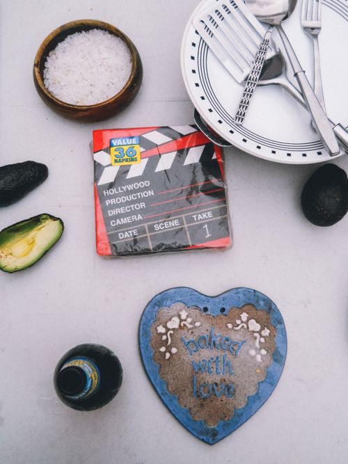 Free A flat lay featuring avocados, utensils, and kitchen items on a Tijuana table. Stock Photo