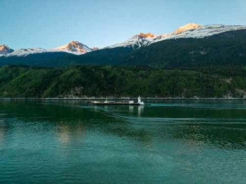 River with Hills and Mountains behind