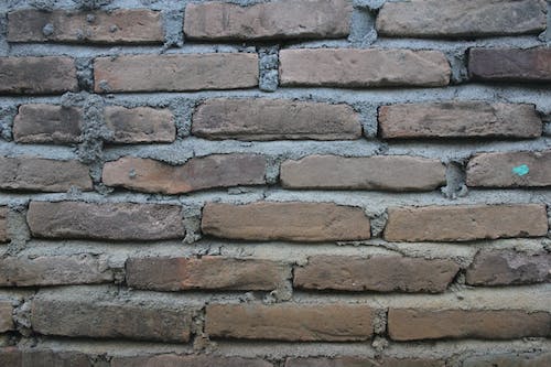 Free Brown Bricked Wall Stock Photo