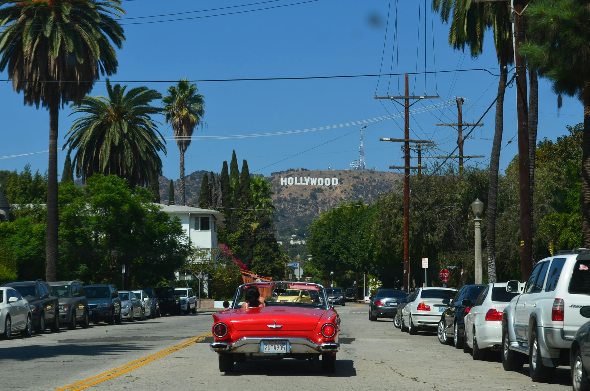 Vintage car going down Hollywood blvd. Img Via Pexels