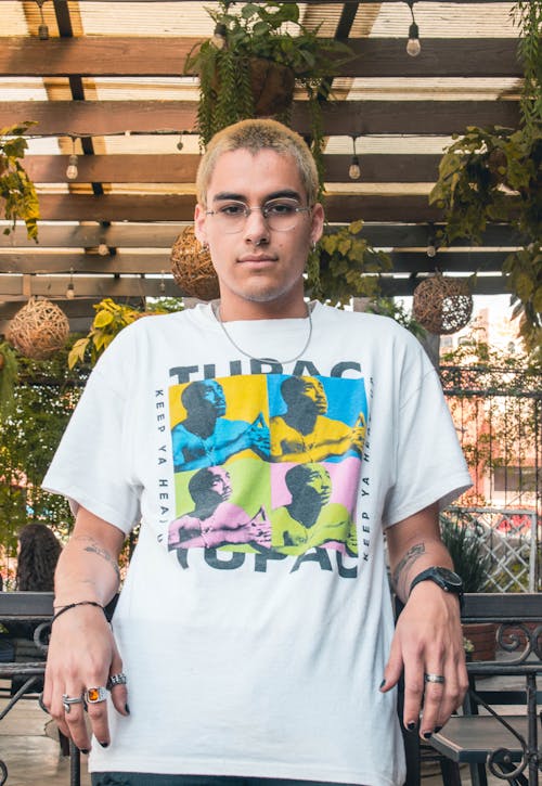 Man with Dyed, Blonde Hair Posing in White T-shirt