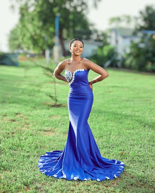 Woman Posing in Blue Dress