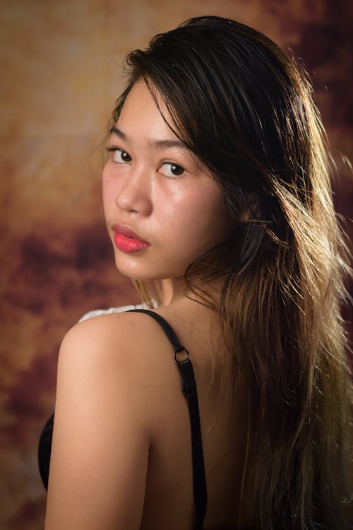 Woman with Brown Hair Posing