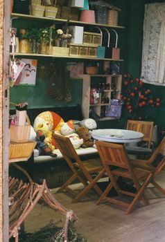 Warm and inviting room with wooden furniture and colorful plush toys creating a cozy atmosphere.