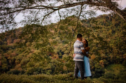 Loving Couple Embracing Each Other Under Tree