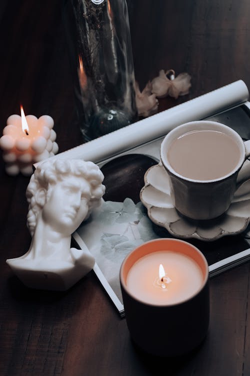 Bust, Wax Candle and Cup