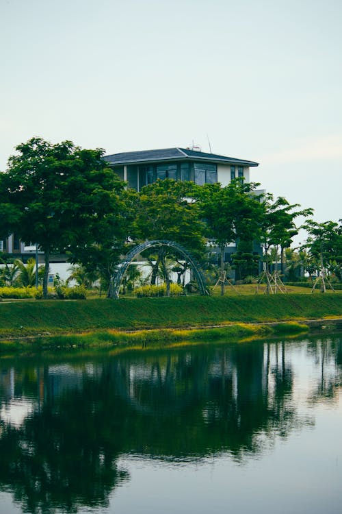 Foto stok gratis danau, kincir air, langit