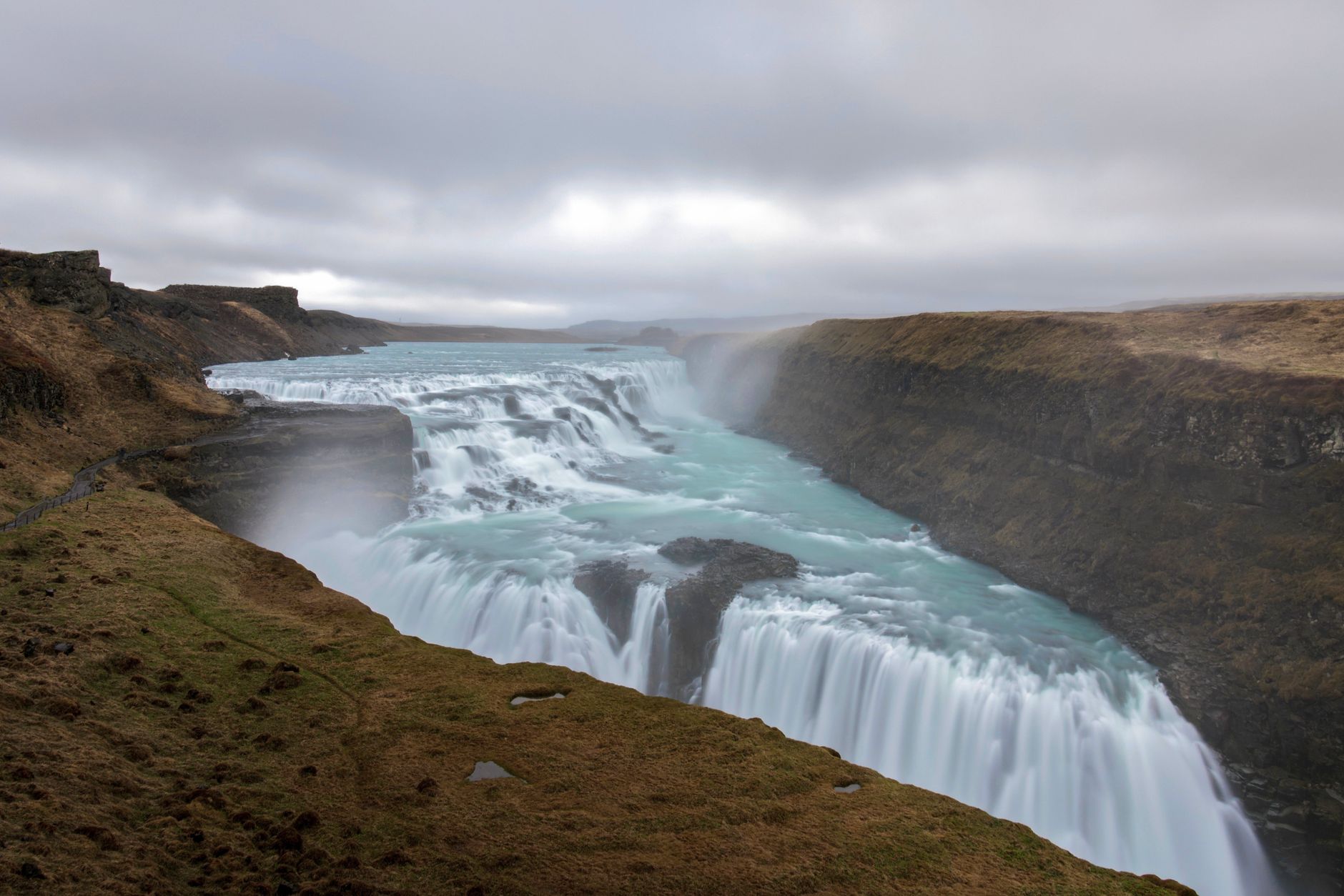 Strokkur geyser erupting on the Golden Circle route