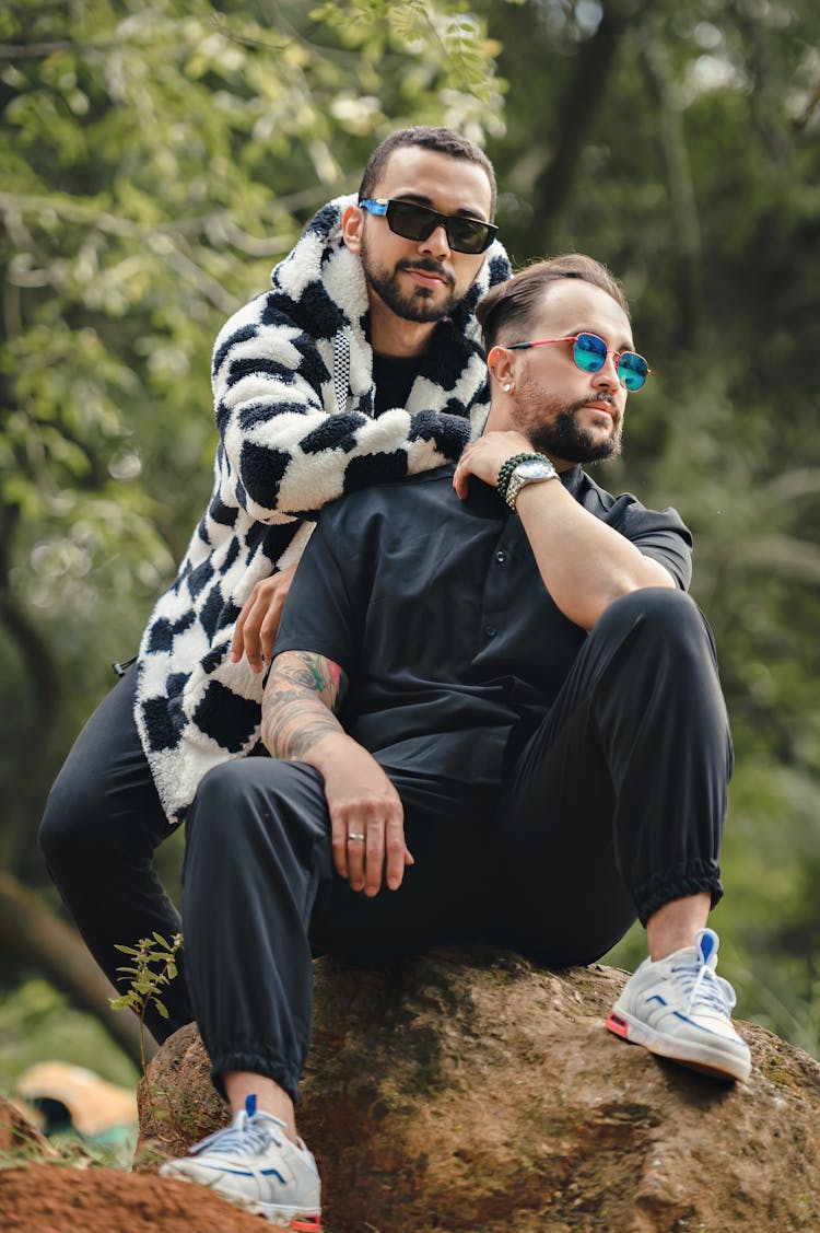 Man Posing Together On Rock