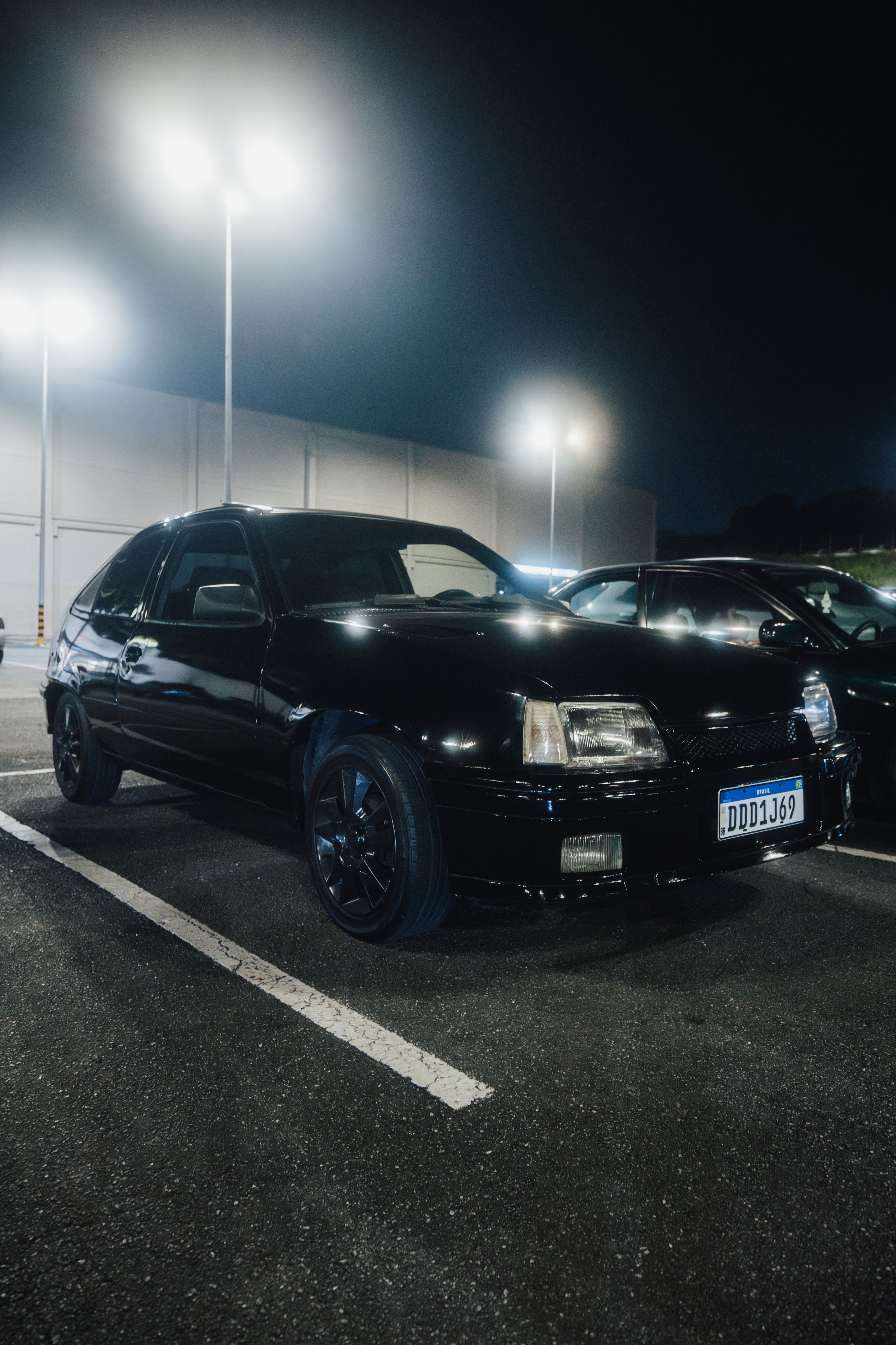 Nissan Skyline GT-R on a Parking Lot at Night · Free Stock Photo