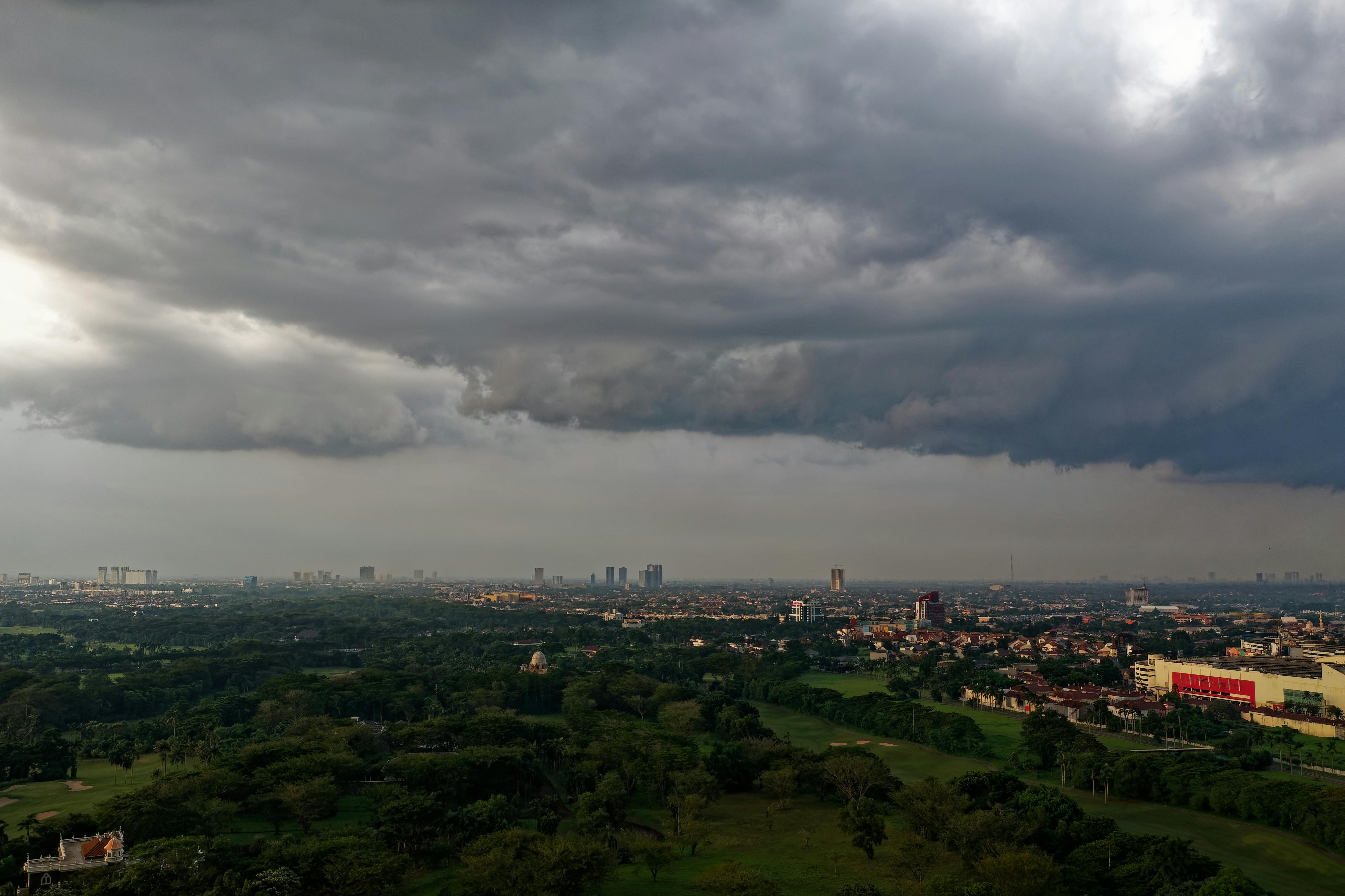 bird s eye view of city under cloudy sky