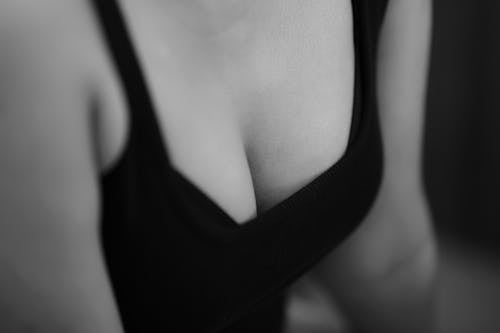 Close-up of a Woman in a Black Tank Top 