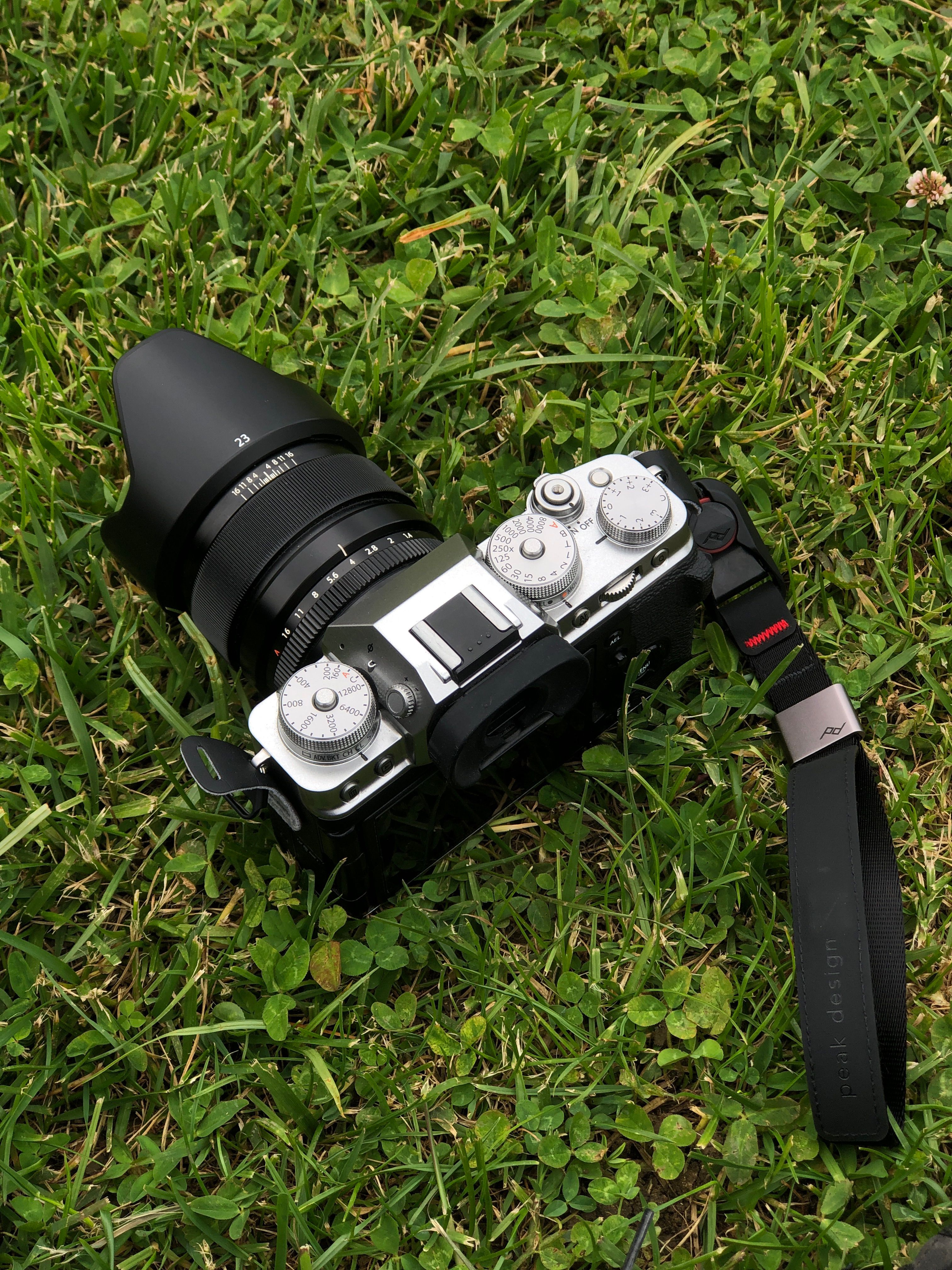 Close-up of Camera Lying in the Grass · Free Stock Photo