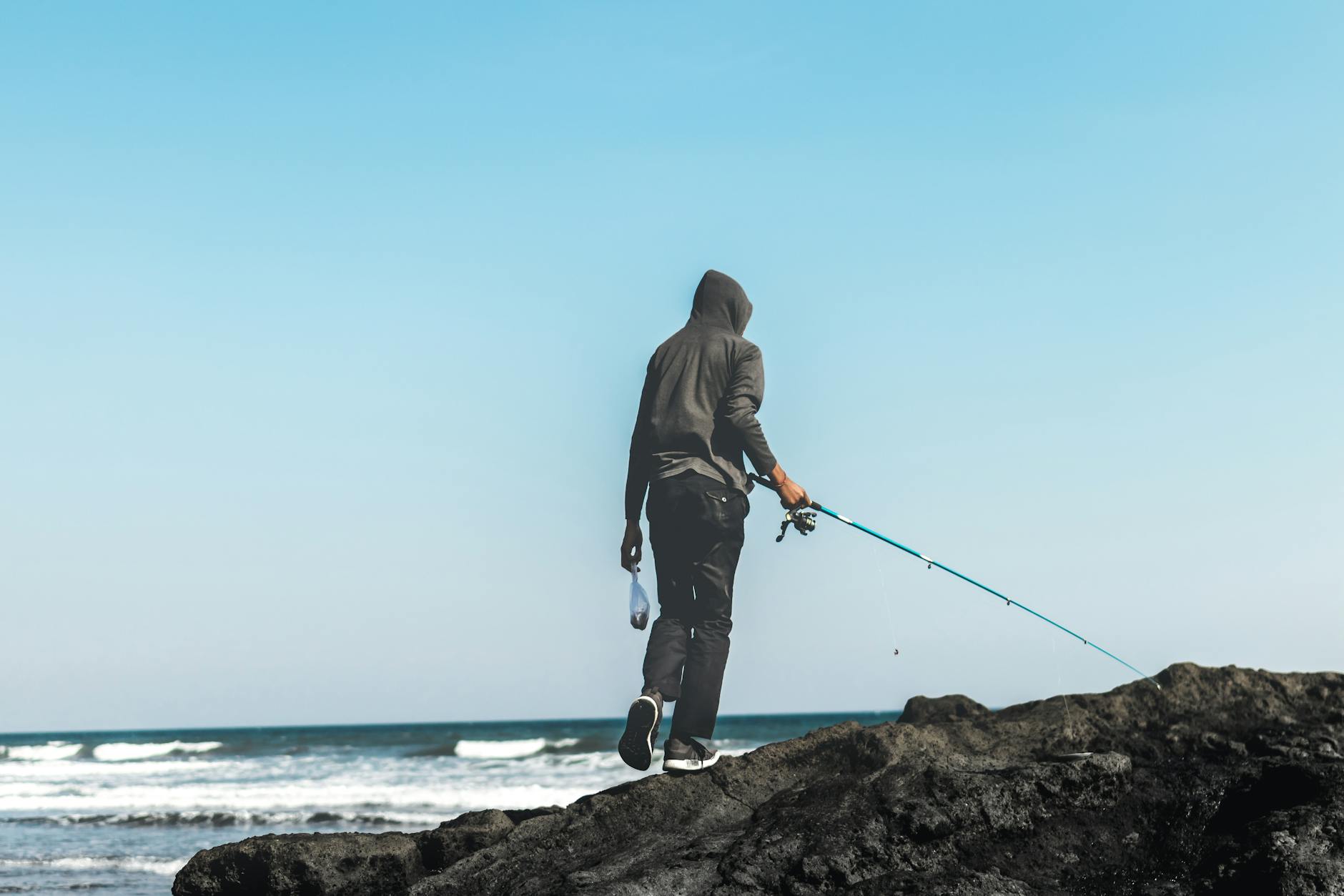 Man holding a fishing rod