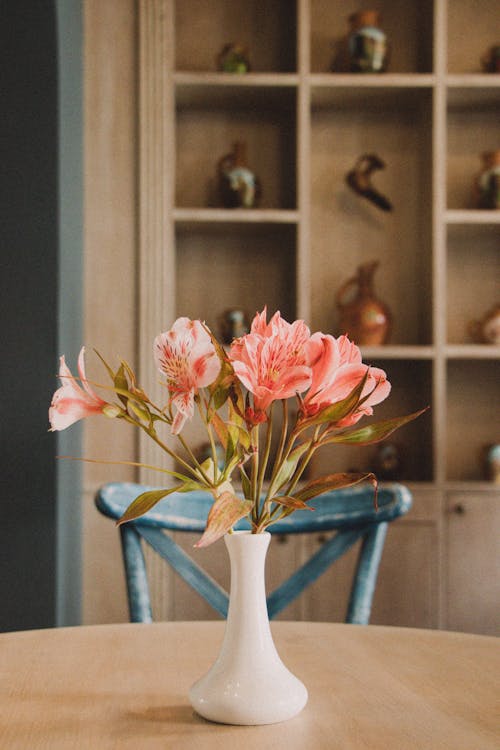 Free Blooming Flowers in Vase on Table Stock Photo